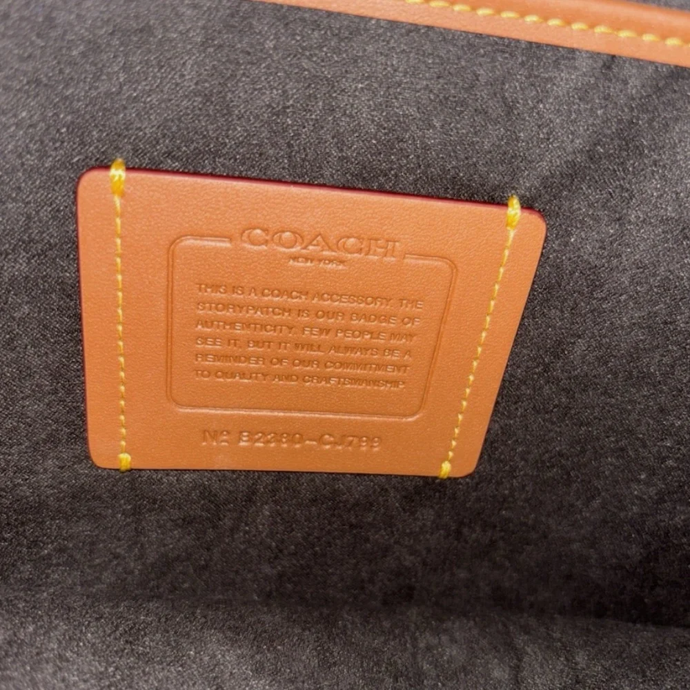 coach zip around laptop case in signature canvas (charcoal)